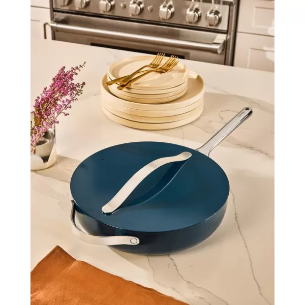 imageCaraway Nonstick Ceramic Saut Pan with Lid 45 qt 118quot  Non Toxic PTFE ampamp PFOA Free  Oven Safe ampamp Compatible with All Stovetops Gas Electric ampamp Induction  NavyGray