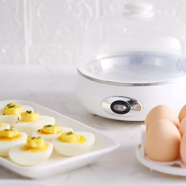 imageElite Gourmet EGC322CW Easy Egg Cooker Electric 7Egg Capacity Soft Medium HardBoiled Egg Cooker with Auto ShutOff Measuring Cup Included BPA Free Classic WhiteClassic White