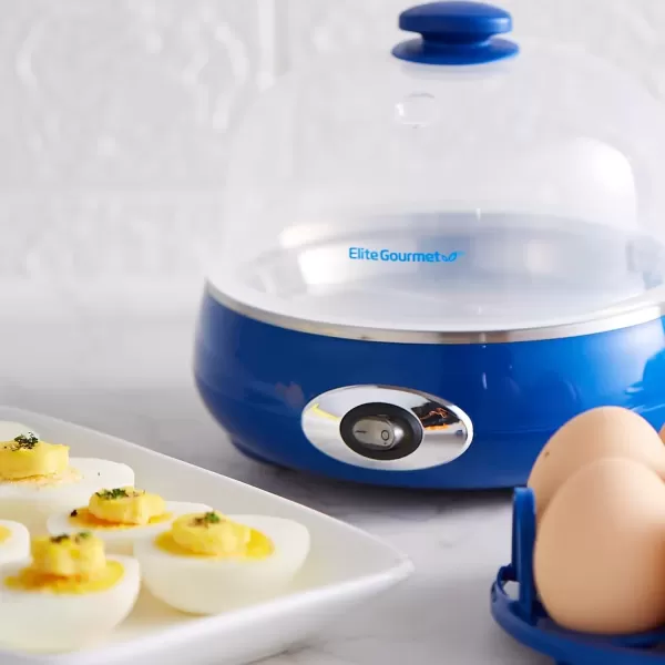 imageElite Gourmet EGC322CW Easy Egg Cooker Electric 7Egg Capacity Soft Medium HardBoiled Egg Cooker with Auto ShutOff Measuring Cup Included BPA Free Classic WhiteBlue