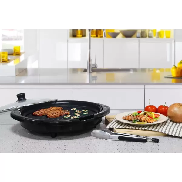 imageElite Gourmet EMG980BSC Large Indoor Electric Round Nonstick Grill Cool Touch Fast Heat Up Ideal LowFat Meals Easy to Clean Design Dishwasher Safe Includes Glass Lid 14quot Round B Black14 Round B