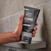 imageDove MenCare Body and Face Scrub Costal Cedar Deeply Exfoliates for Hydrated ampamp Nourished Skin 100 Gentle Cleanser No Sulfate Cleansers or Parabens 98 Biodegradable Formula 9 ozCharcoal  Clove