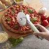 imageKitchenAid Gourmet Stainless Steel Pizza Wheel with Sharp Blade to Easily Cutting Pizza Crusts Pies and more Finger Guard for Safety and Comfort Grip to Protect Fingers Dishwasher Safe BlackPistachio