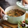 imageKitchenAid Seasoned Cast Iron Dutch OvenCasserole 6 Quart  BlackPistachio