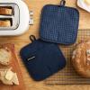 imageKITCHENAID Gourmet Series Gridlines Pot Holders 2Pack Set Heat Resistant up to 600F Soft Silicone Grip Magnetic Cuff Passion Red 8quotx8quotInk Blue