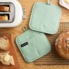 imageKITCHENAID Gourmet Series Gridlines Pot Holders 2Pack Set Heat Resistant up to 600F Soft Silicone Grip Magnetic Cuff Passion Red 8quotx8quotPistachio Green