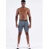 imageNELEUS Mens 3 Pack Running Compression Shorts with Pockets6082 BlackGreyNavy Blue 3 Pack