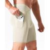imageNELEUS Mens Compression Short with Pocket Dry Fit Yoga Running Shorts Pack of 36115 BlackGreyCreamy White  3 Pack
