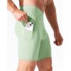 imageNELEUS Mens Compression Short with Pocket Dry Fit Yoga Running Shorts Pack of 36115 BlackGreyLight Green  3 Pack