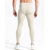 imageNELEUS Mens Dry Fit Compression Pants Workout Running Leggings6107 BlackCreamy White 2 Pack