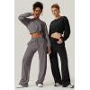 imageQINSEN Women 2 Piece Outfits Sweatsuit Set Twist Front Cropped Sweatshirt Wide Leg Sweatpant Lounge Set TracksuitBlack