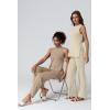 imageQINSEN Lounge Sets for Women Two Piece Outfits Knit Sleeveless Vented Hemline Tops Wide Leg Pants Sweater SetsBeige