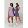 imageQINSEN Womens Open Back Tennis Dress Sleeveless Built in Shorts Golf Athletic Dress with PocketsLavender