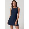 imageQINSEN Womens Open Back Tennis Dress Sleeveless Built in Shorts Golf Athletic Dress with PocketsNavy