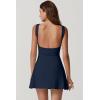 imageQINSEN Womens Open Back Tennis Dress Sleeveless Built in Shorts Golf Athletic Dress with PocketsNavy