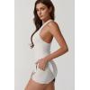 imageQINSEN Womens Crewneck Criss Cross Open Back Tennis Dress Sleeveless Built in Shorts Golf Athletic Dresses with PocketsOffwhite
