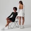 imageQINSEN Womens Open Back Tennis Dress Long Sleeve Built in Shorts Golf Athletic Dress with PocketsWhite