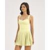 image:imageQINSEN Womens V Neck Pleated Tennis Dresses Built in Shorts Cross Back Sleeveless Athletic Dress with PocketsYellow