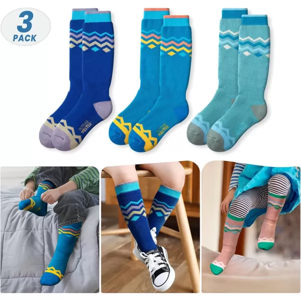 OutdoorMaster Kids Ski Socks 2Pair Pack Snowboarding Socks for Toddler Boys and Girls Over the Calf Design wNonSlip Cuff3packblue Mountainampblue Skyampwoodland Green