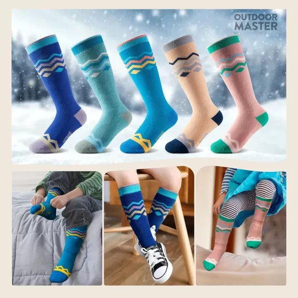 OutdoorMaster Kids Ski Socks 2Pair Pack Snowboarding Socks for Toddler Boys and Girls Over the Calf Design wNonSlip CuffBlue Mountains