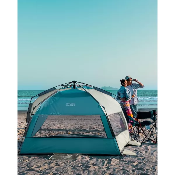 OutdoorMaster Pop Up Beach Tent for 4 Person  Easy Setup and Portable Beach Shade Sun Shelter Canopy with UPF 50 UV Protection Removable Skylight Family Size  BlueCancun Seashore XLarge