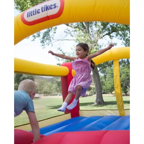 Little Tikes Jump n Slide Inflatable Bouncer Includes Heavy Duty Blower With GFCI Stakes Repair Patches And Storage Bag for Kids Ages 38 YearsJump n Slide Bounce House