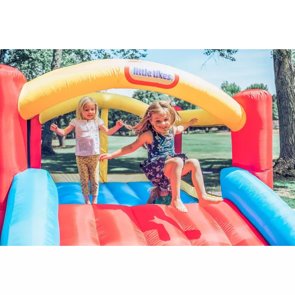 imageLittle Tikes Jump n Slide Inflatable Bouncer Includes Heavy Duty Blower With GFCI Stakes Repair Patches And Storage Bag for Kids Ages 38 YearsMulti