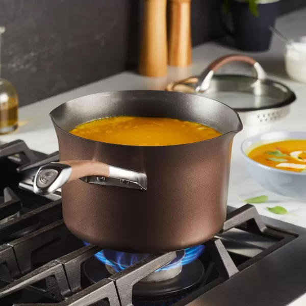Circulon Symmetry Hard Anodized Nonstick Sauce Pan/Saucepan with Straining and Lid , 3.5 Quart, Brown