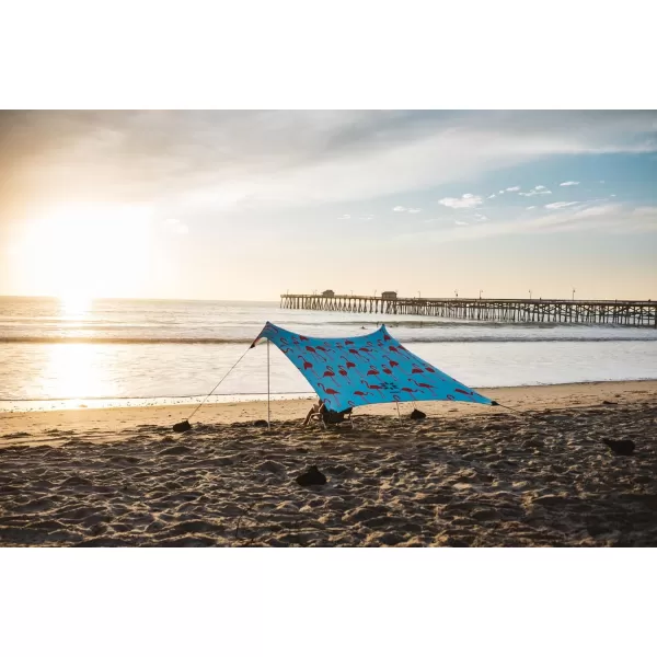 imageNeso Tents Beach Tent with Sand Anchor Portable Canopy Sunshade  7 x 7  Patented Reinforced CornersPeriwinkle BlueFlamingos