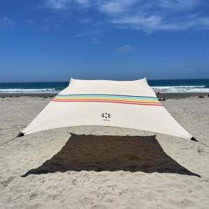 imageNeso Gigante  Portable Beach Tent  Ideal to Enjoy with Family and Friends  UPF 50 WaterResistant and Lightweight  Aqua Fronds 11 x 11Rainbow
